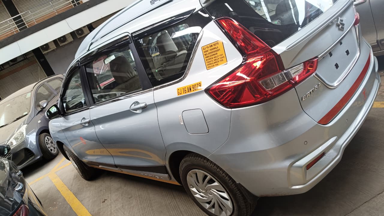7-Seater Ertiga Cab Side View - Spacious Family Taxi in Ankleshwar