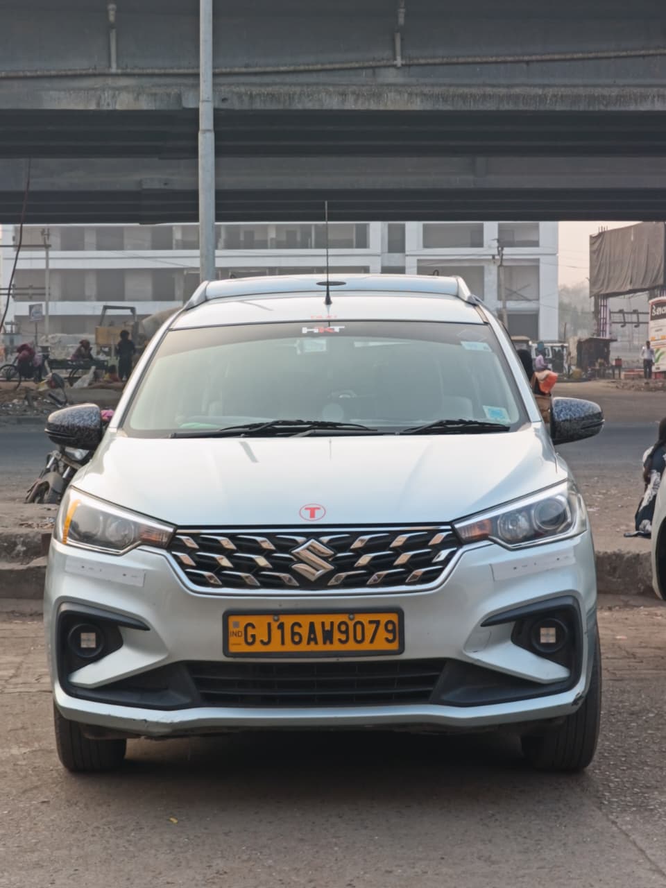 Premium 7-Seater Ertiga Taxi Service in Ankleshwar - HK Travels Front View
